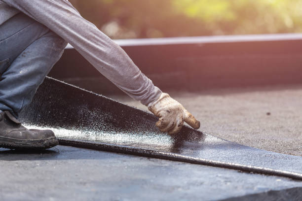 Professional Basement Waterproofing technician working in Irwin, OH